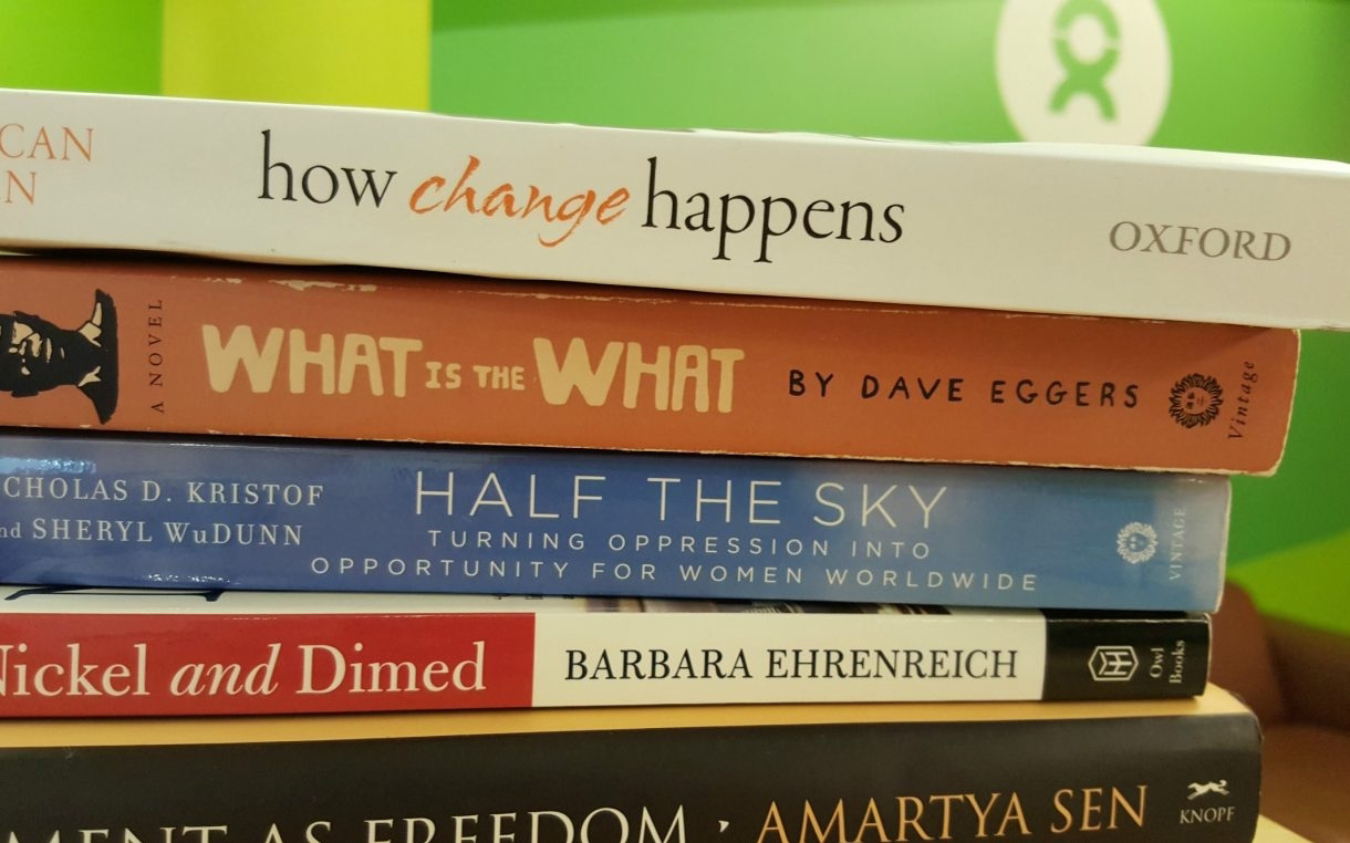 Just a few of the books we're currently reading. Photo: Oxfam America
