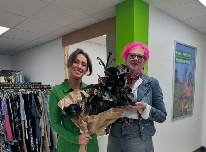 Sue with Fiona Anderson, Manager of Oxfam Holywood Superstore. Records were cut into a bouquet for the Superstore opening